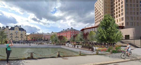 Bild på hotellet och kajen vid maren